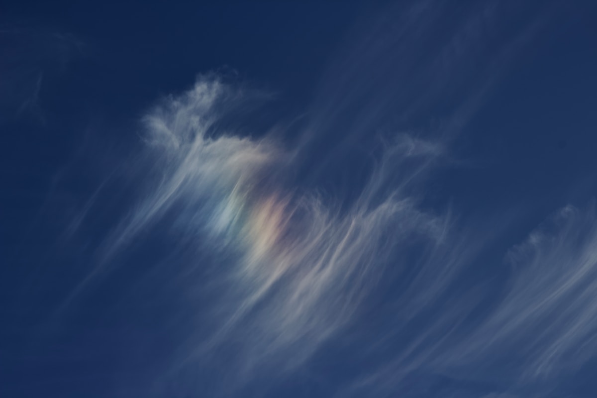 Rainbow Clouds Light Up the Sky in Two Countries at Once!